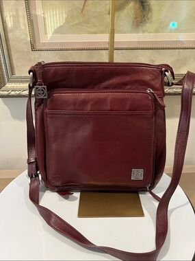 Gianni Bernini Burgundy Leather Crossbody with Front Pocket and Logo Charm